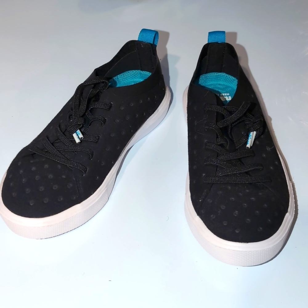 Never worn Native swim shoes size 12 kids shoes